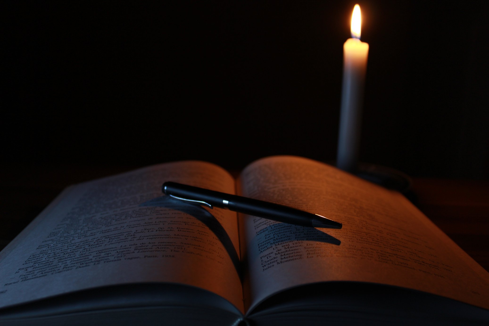 Book and Pen in the Dark